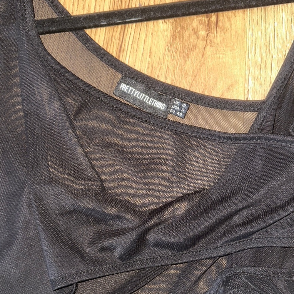 PrettyLittleThing Black Mesh Asymmetrical bodysuit